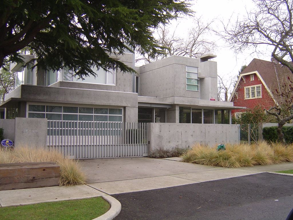 Concrete driveway leading to a modern Perth home